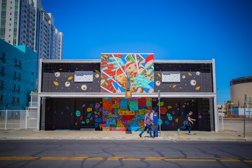 A colorful abstract mural in an urban setting.
