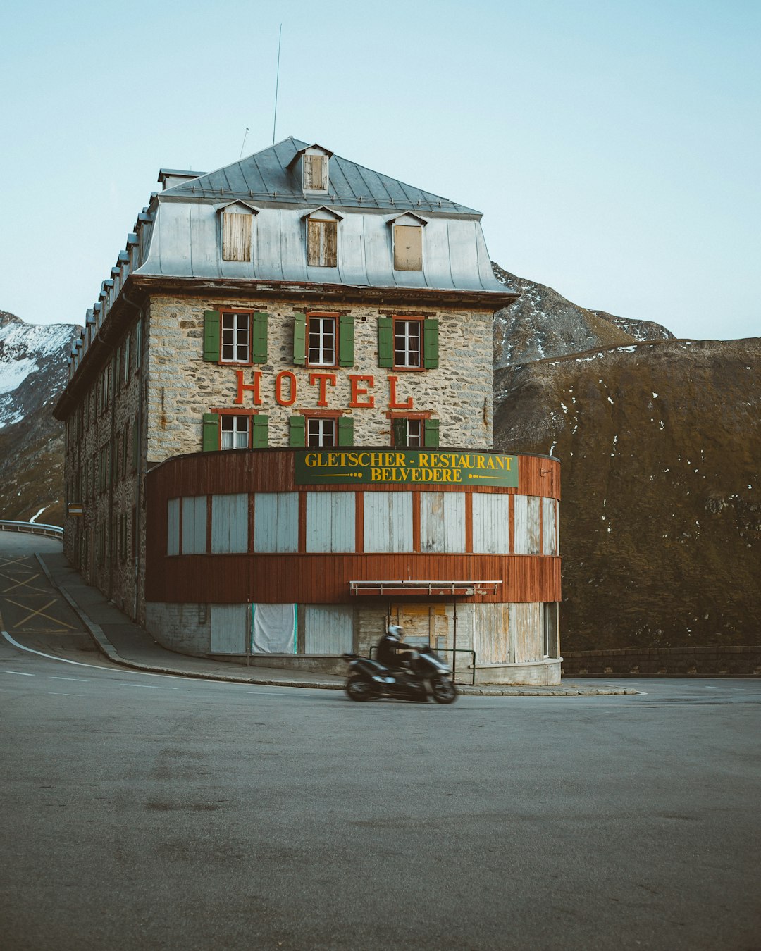 brown and red concrete building during daytime