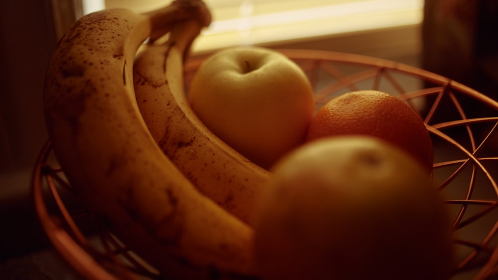 ripe bananas on stainless steel fruit basket