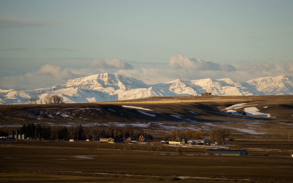 brown and white mountains under blue sky during daytime