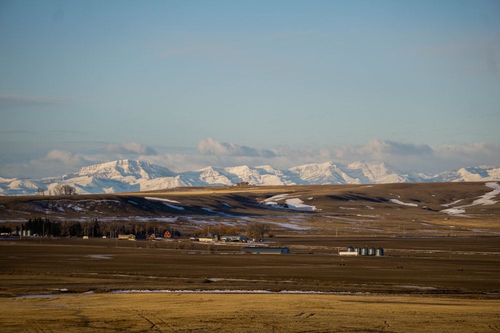 brown and white mountains under blue sky during daytime