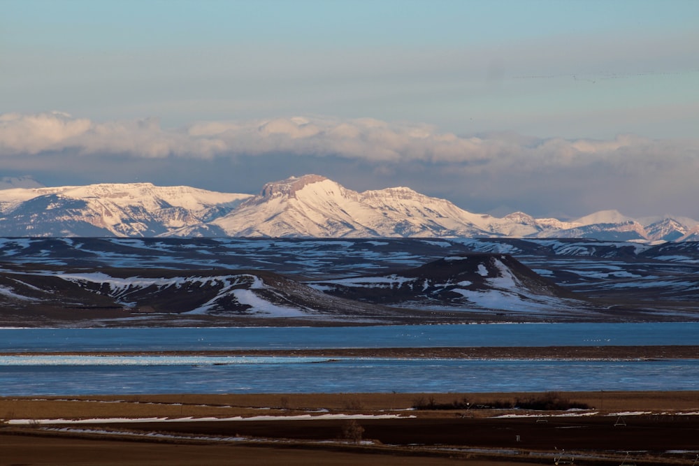 snow covered mountain during daytime