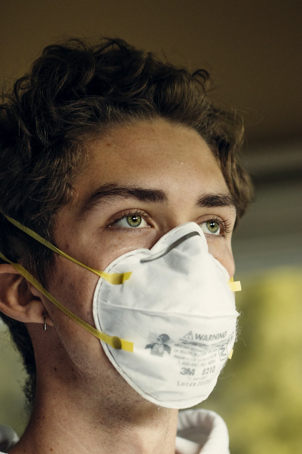 man wearing white face mask