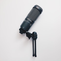 black microphone on white surface