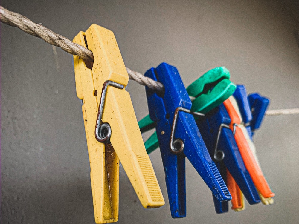 blue and yellow clothes pin