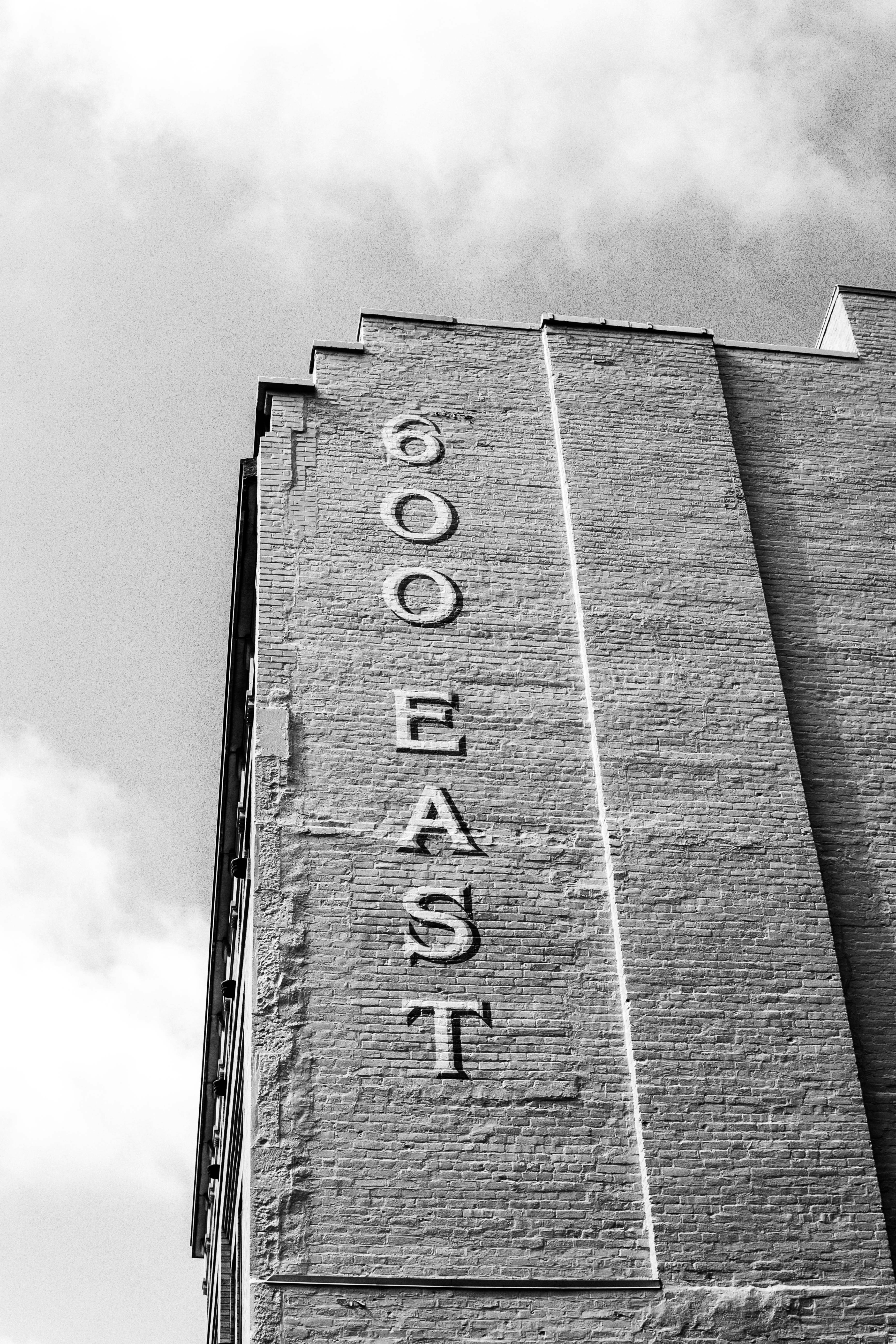 a black and white photo of a tall building