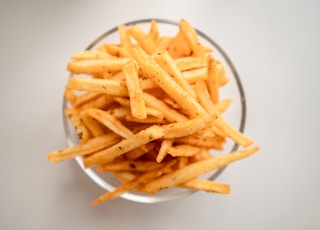 french fries on white ceramic plate