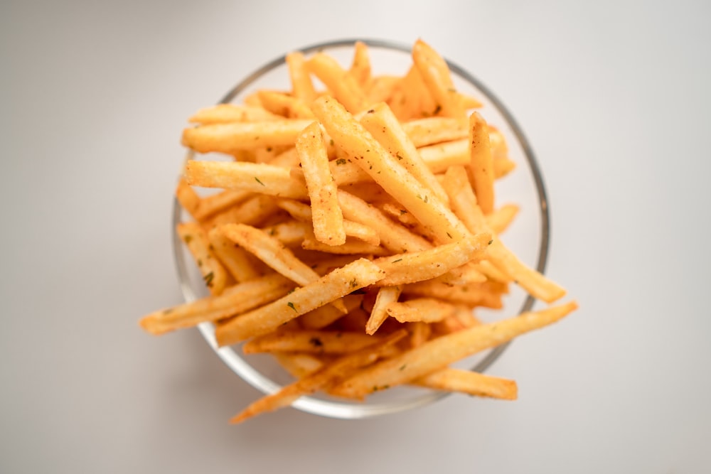 french fries on white ceramic plate