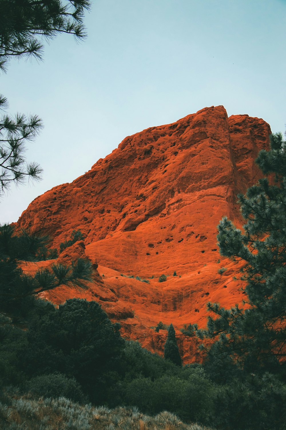 brown rocky mountain under blue sky during daytime