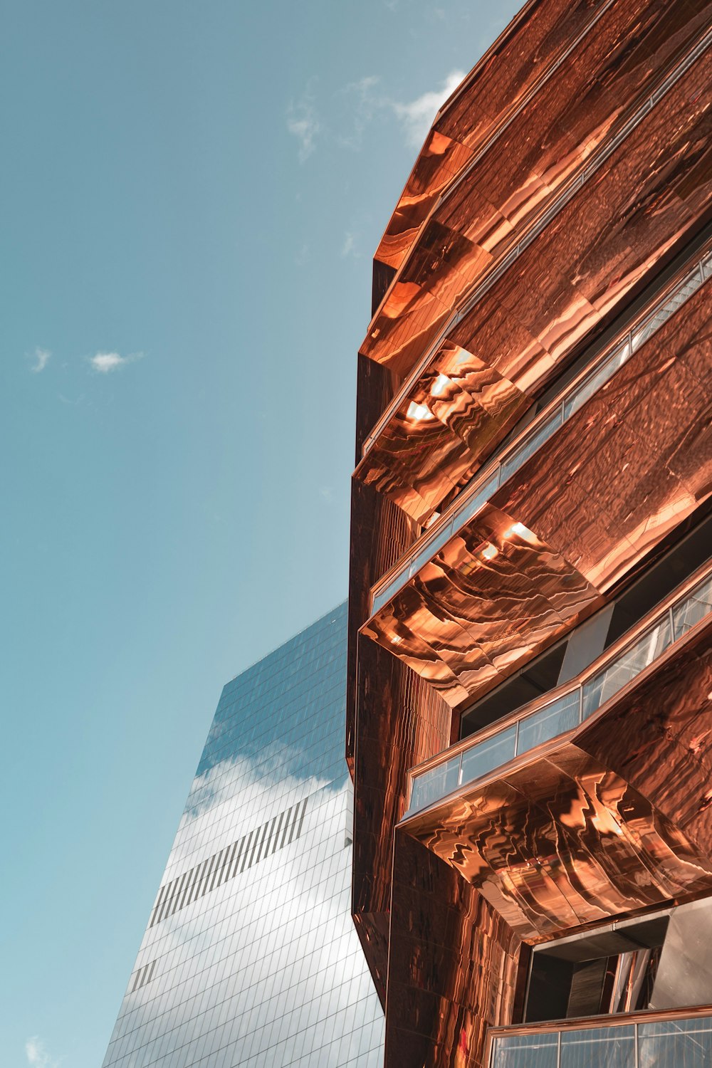 brown concrete building under blue sky during daytime