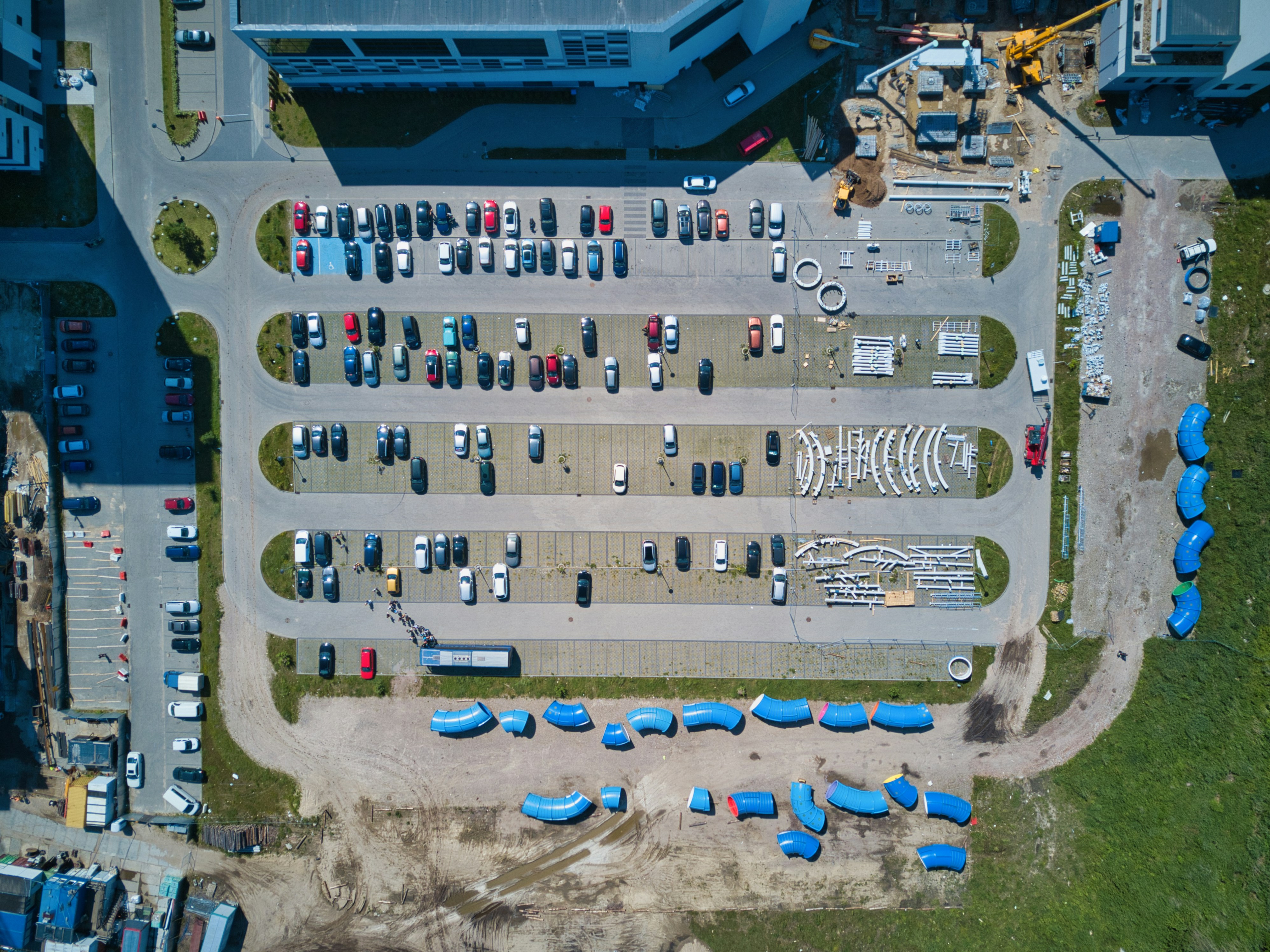 Row of used electric vehicles parked on a dealership lot