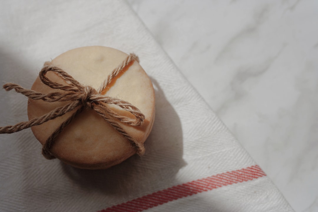 brown garlic on white tissue paper