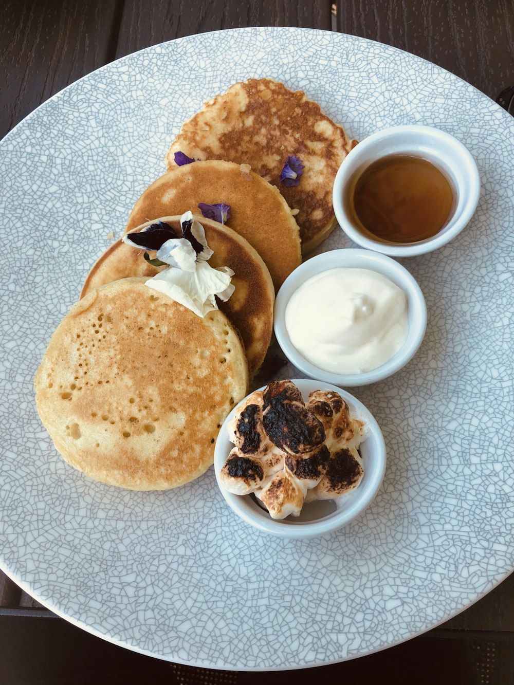 bread with white cream on white ceramic plate