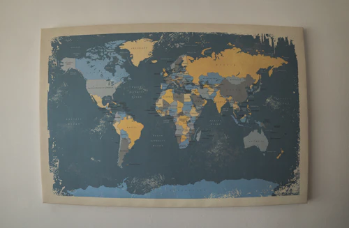 Minimal 3D relief map of the world in soft pastel tones