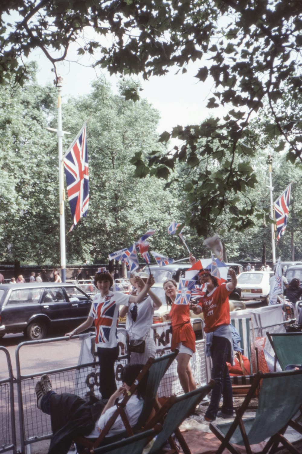 people standing near cars during daytime