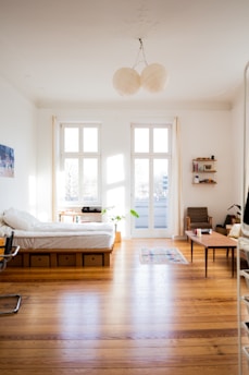 white bed near white window