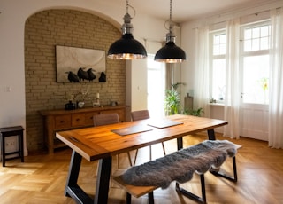 brown wooden table with chairs