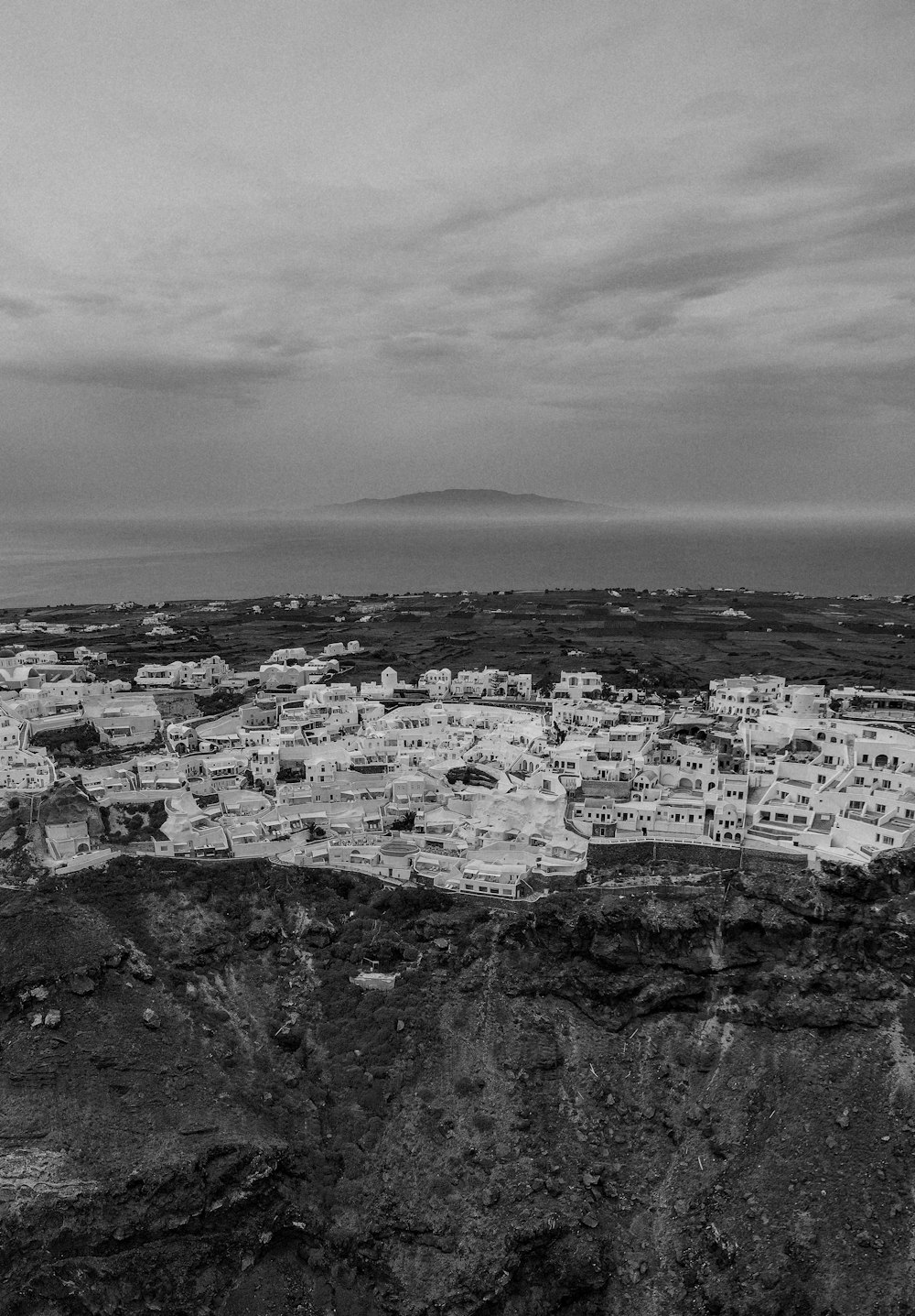 grayscale photo of city buildings