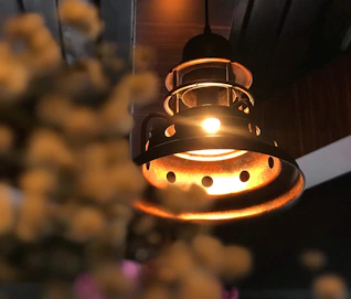 Warm ambient lighting fixtures glowing softly in a modern room.