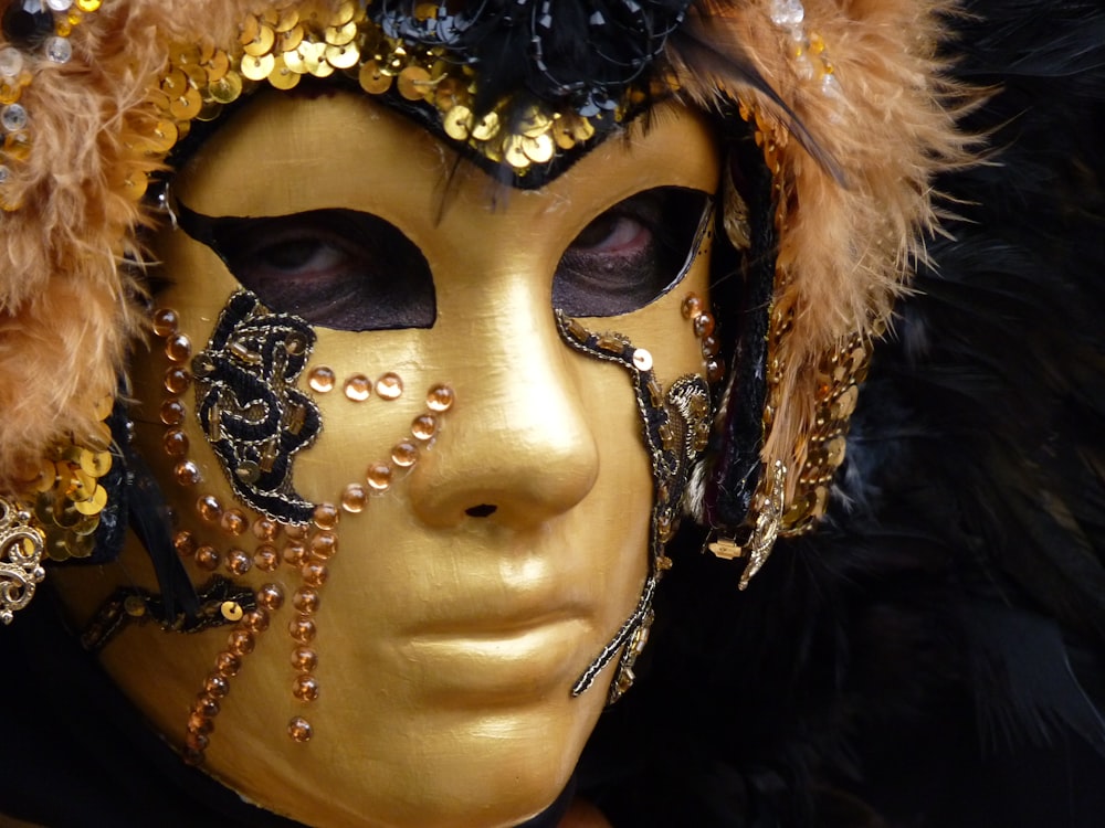gold and black masquerade mask