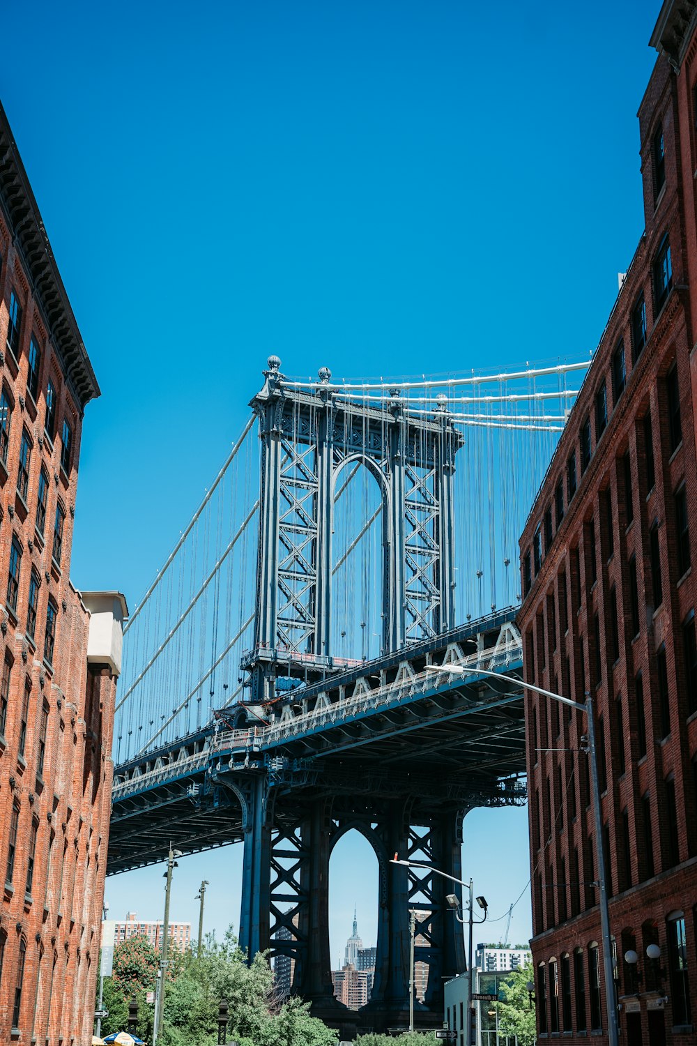 gray bridge under blue sky during daytime