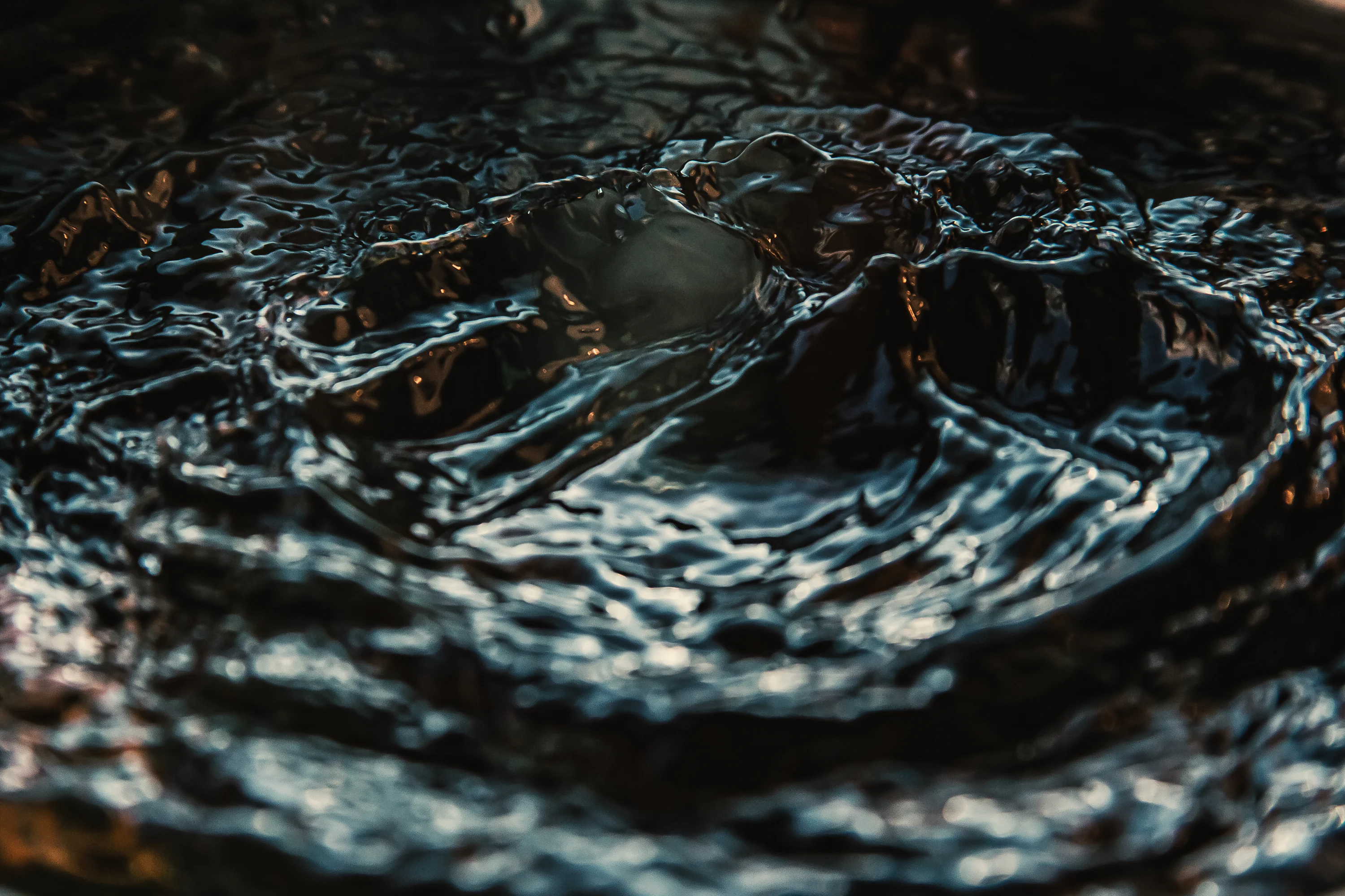 water droplets on body of water