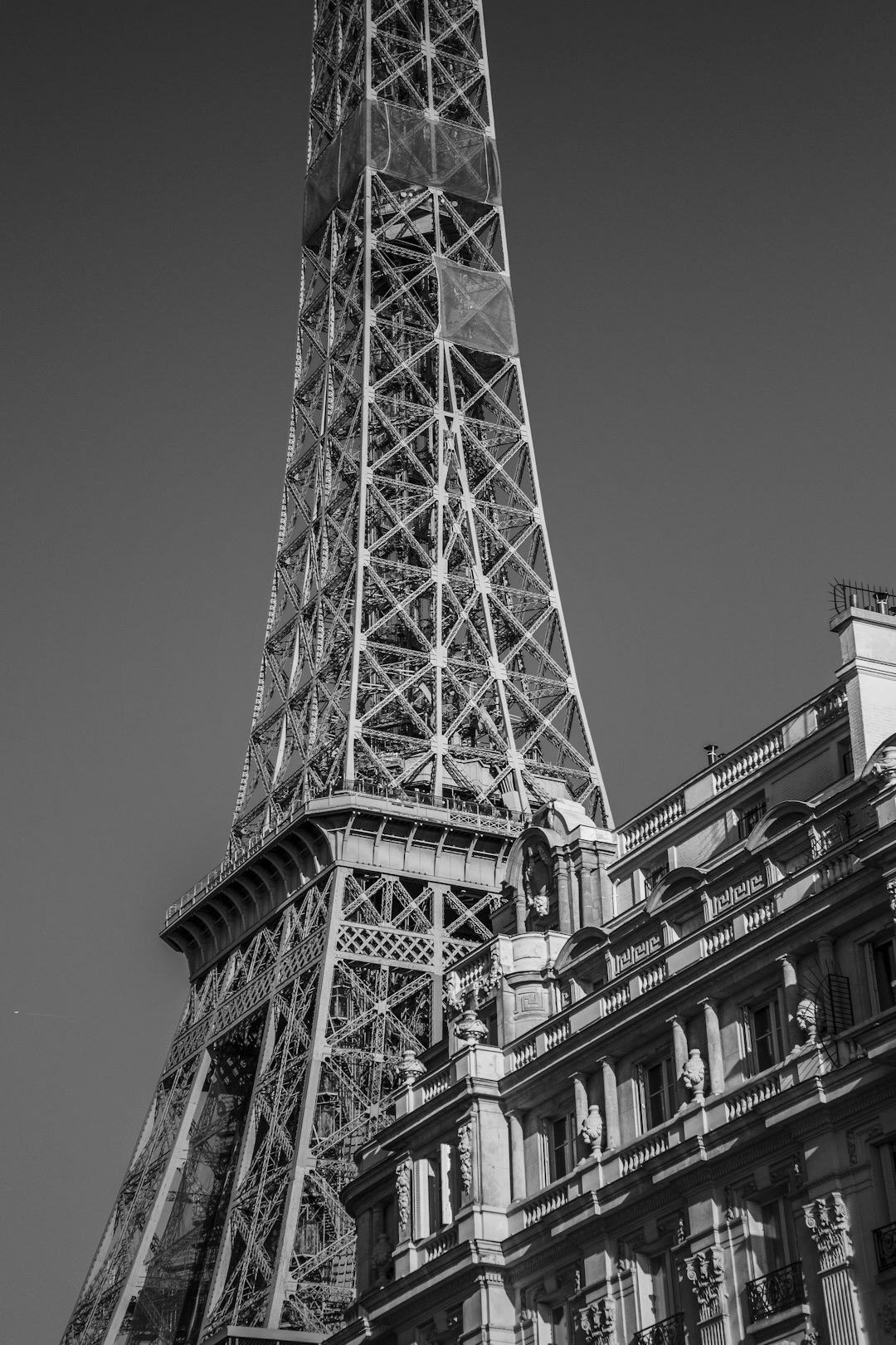 grayscale photo of steel tower
