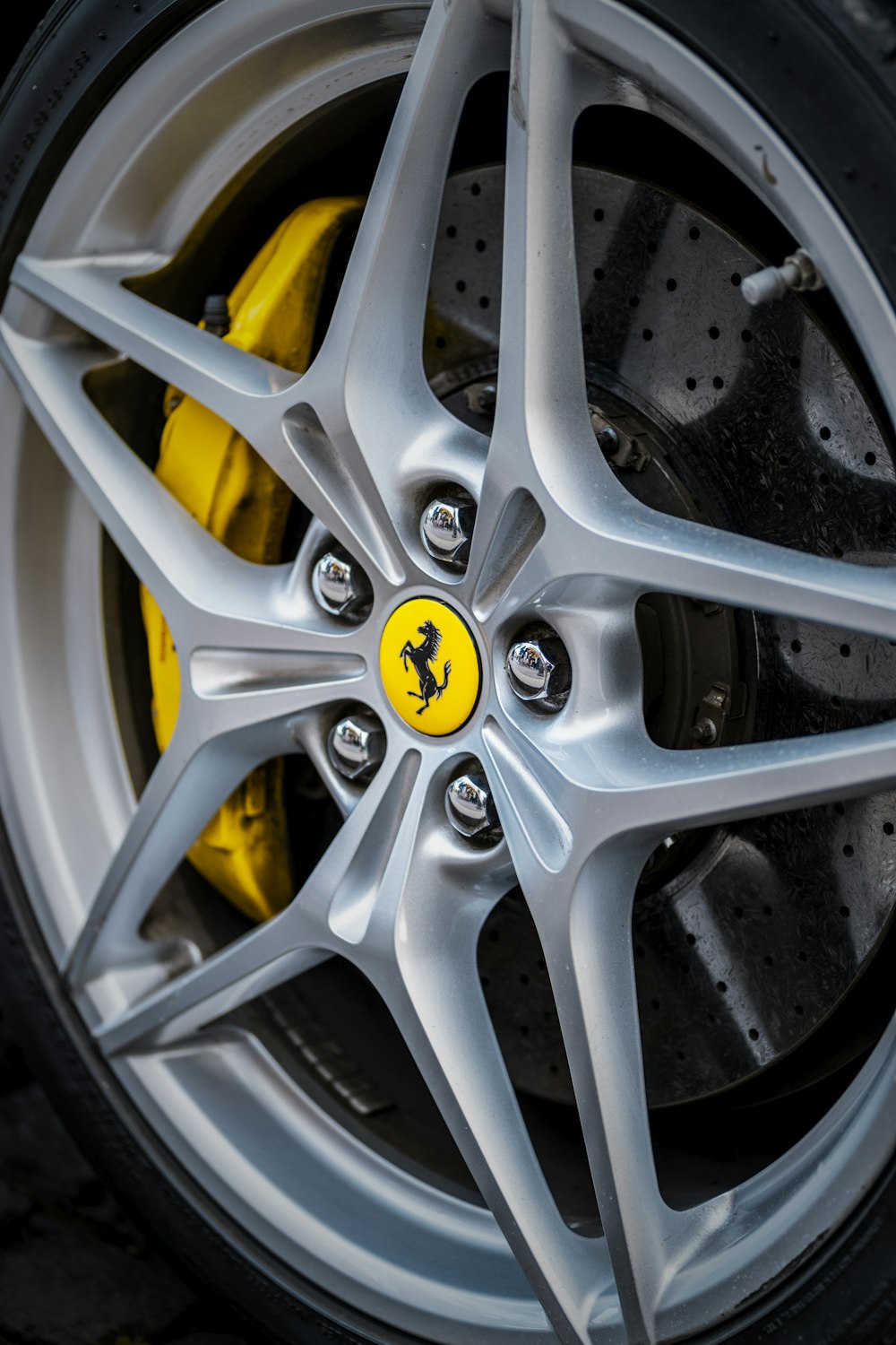 gray and yellow 5 spoke wheel
