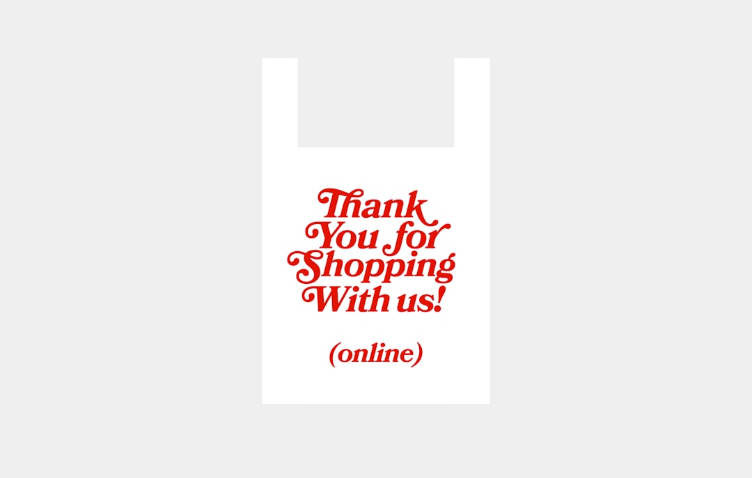A shopping bag with Thank you for shopping with us text printed on it.