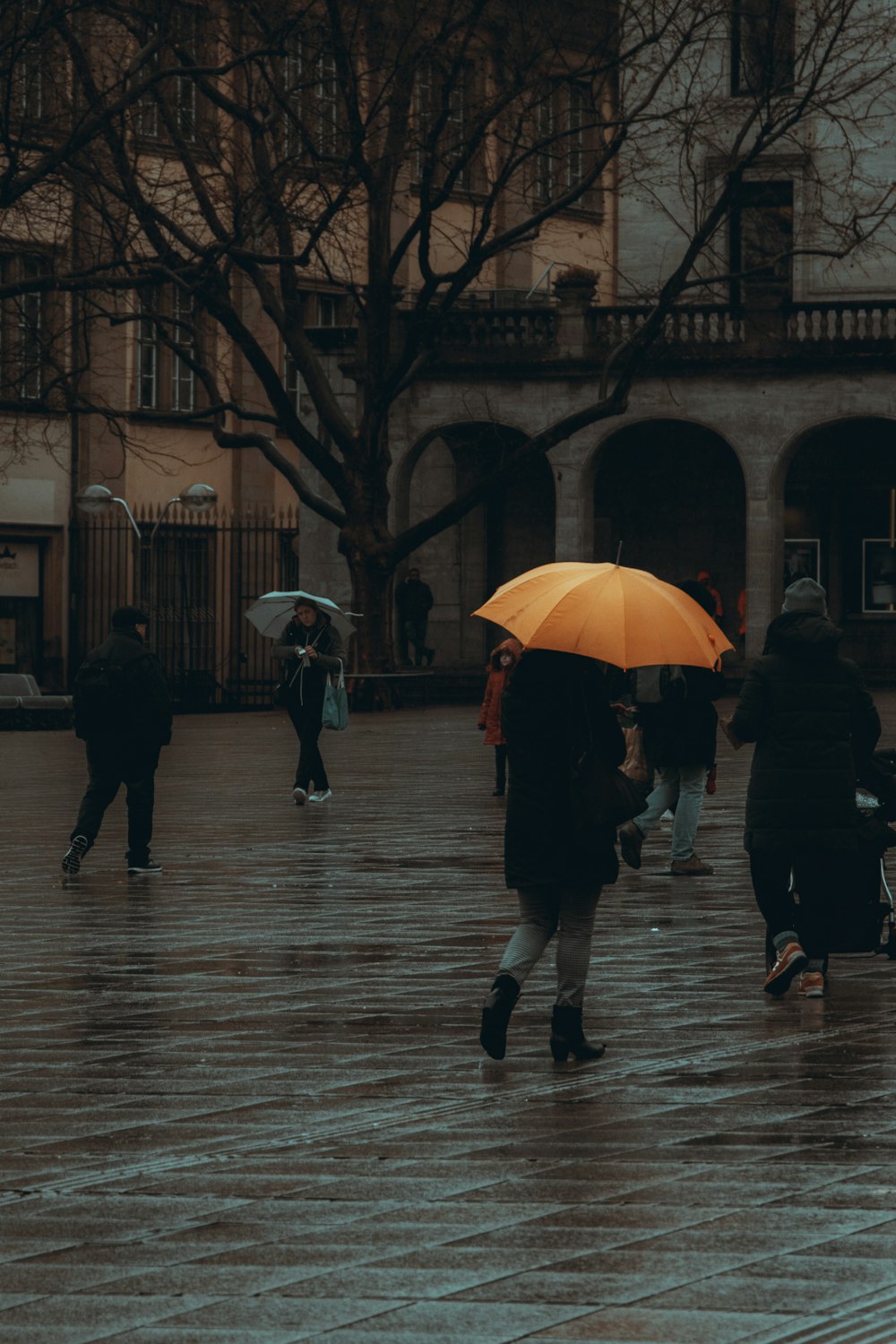 people walking on sidewalk during daytime