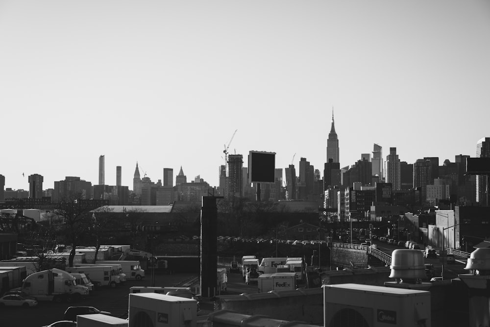 grayscale photo of city buildings