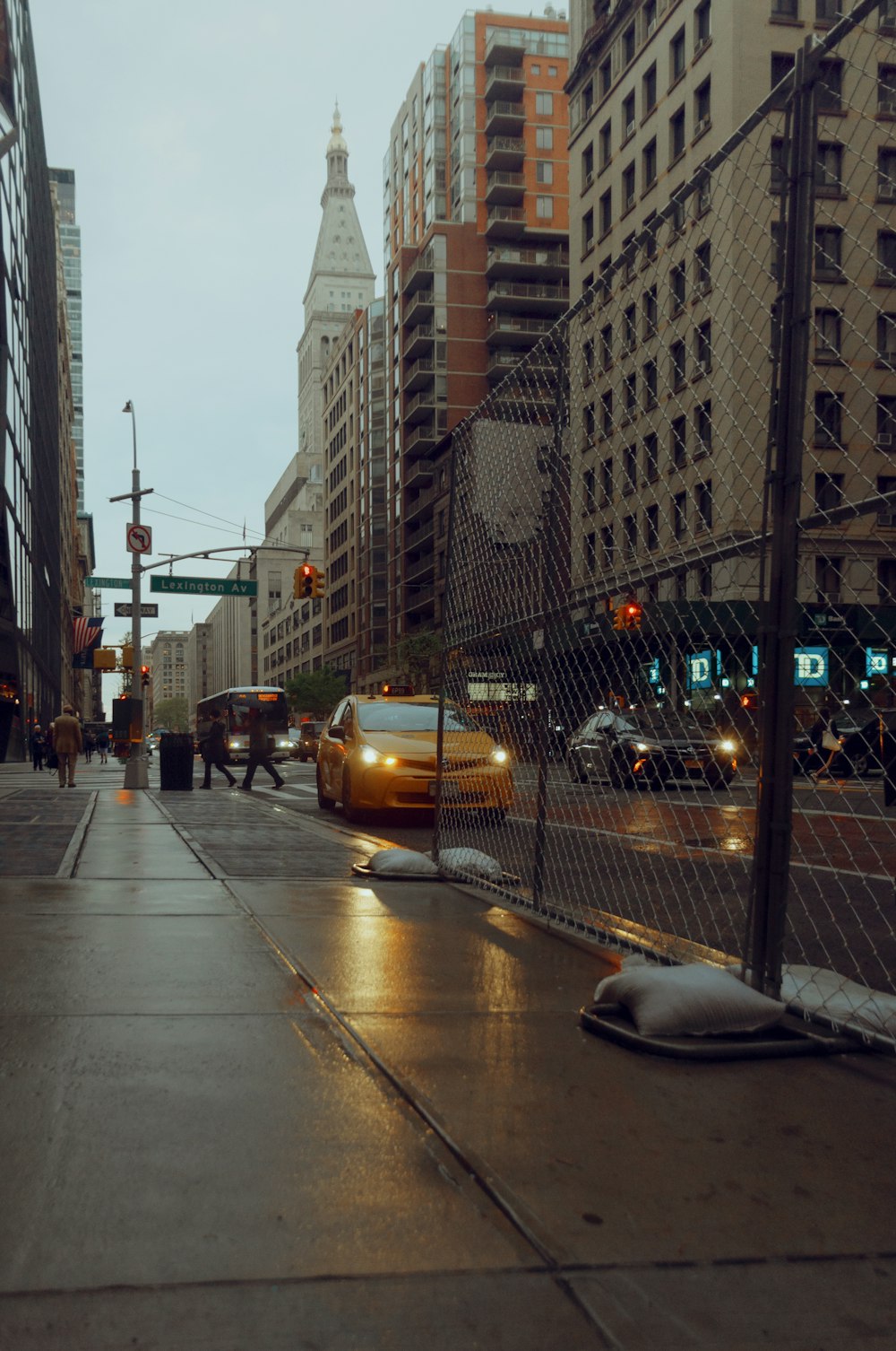 cars on road near buildings during daytime