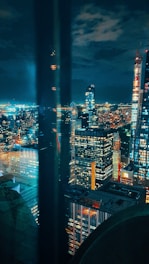 city skyline during night time