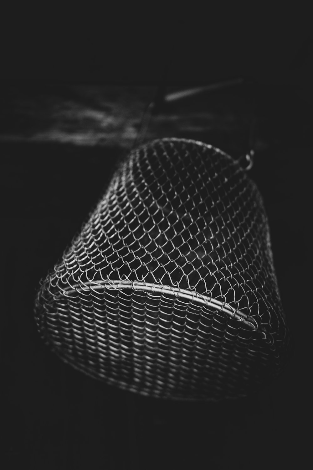 black and white round wicker basket
