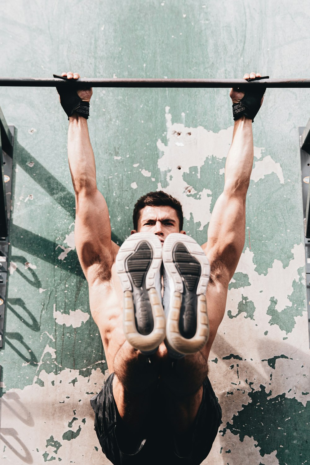 man in black shorts doing exercise