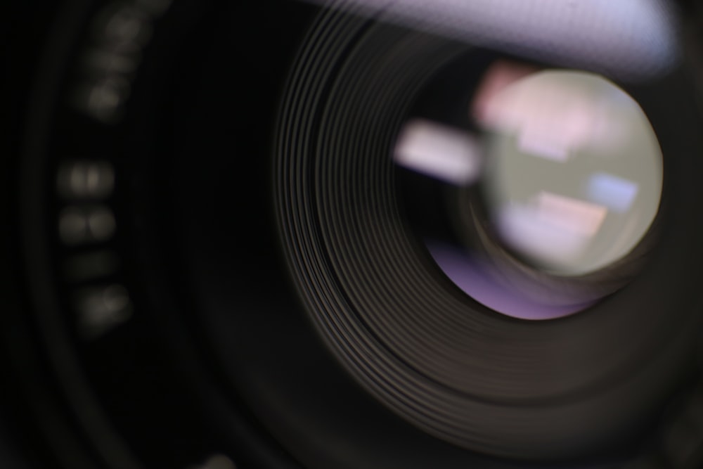 black camera lens on white textile