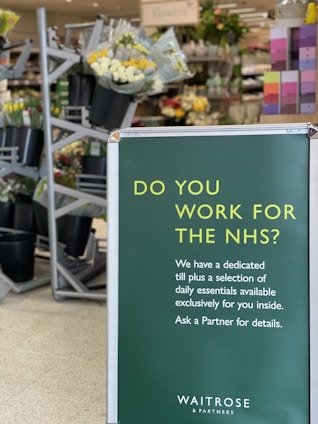 a sign that says do you work for the nhs?