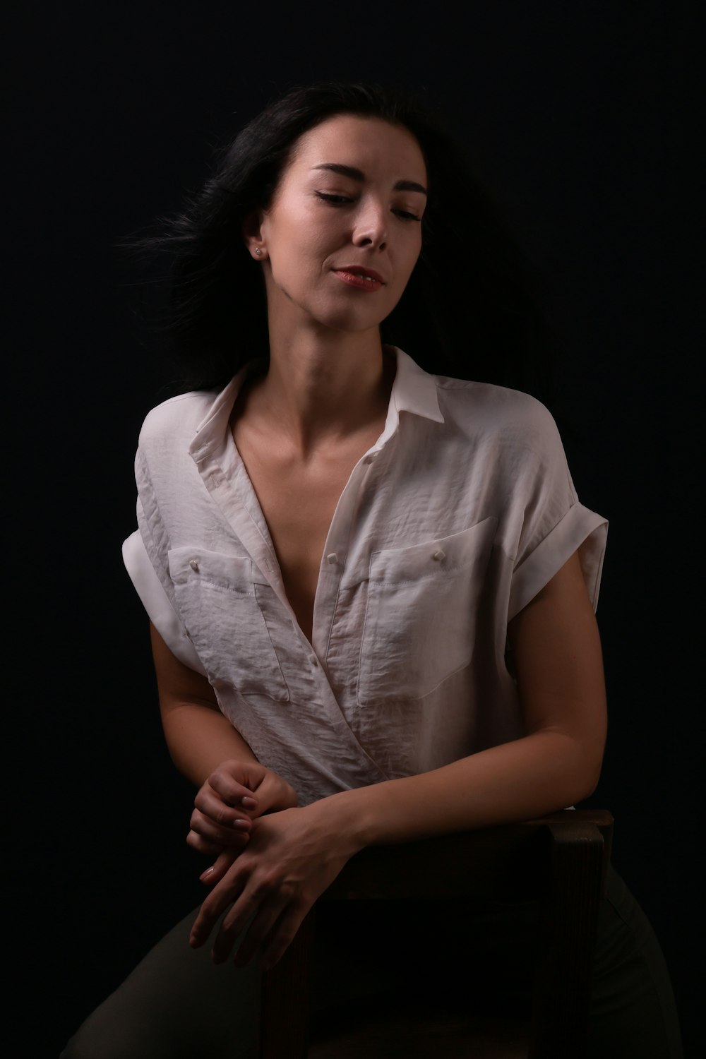 woman in white button up shirt