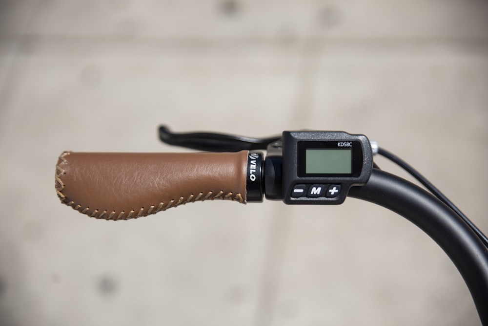 black and brown digital watch on ebike