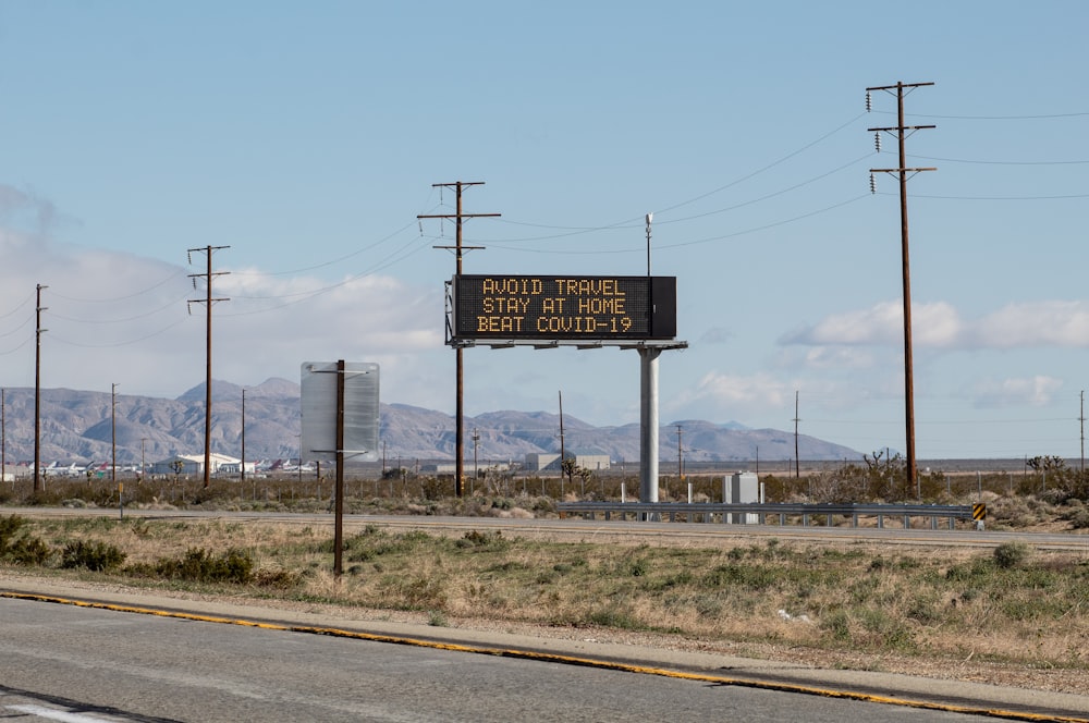 brown and white street sign