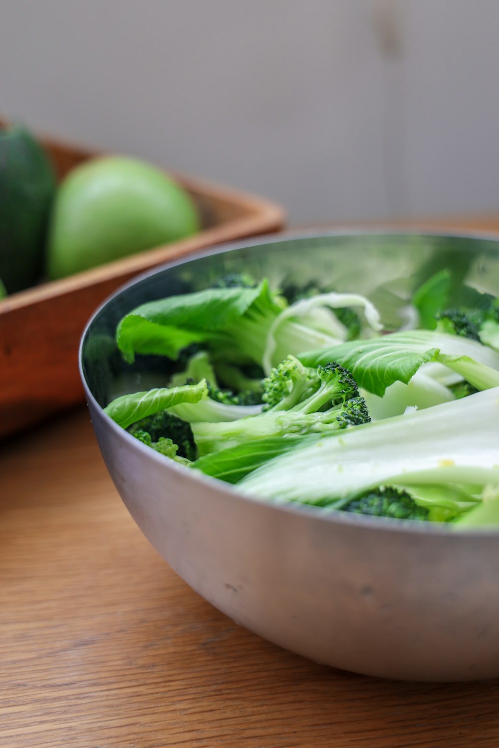 green vegetable on stainless steel bowl