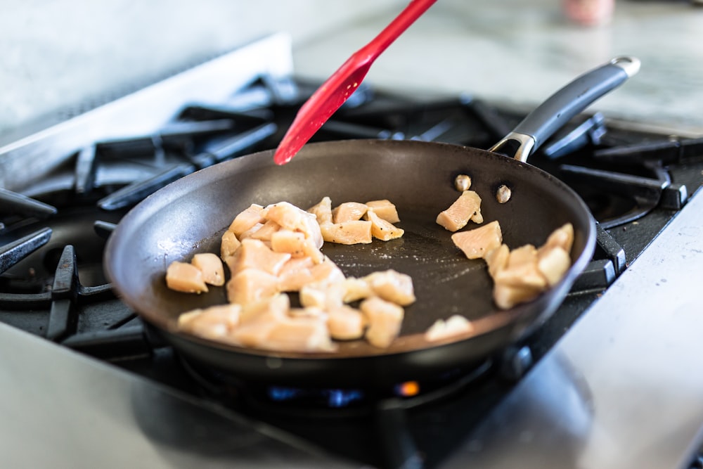 brown cookies on black pan