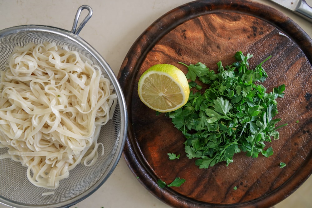 pasta dish on stainless steel round plate