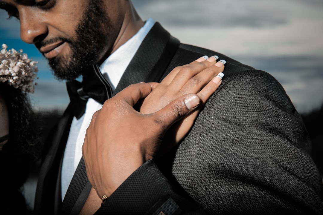 man in black suit jacket