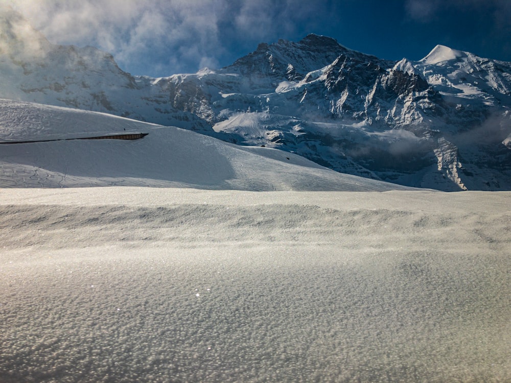 snow covered mountain during daytime