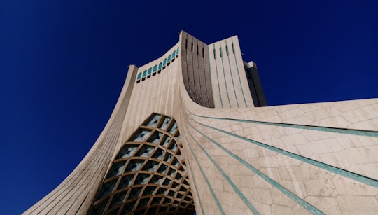 white concrete building under blue sky during daytime in Azadi Tower Iran