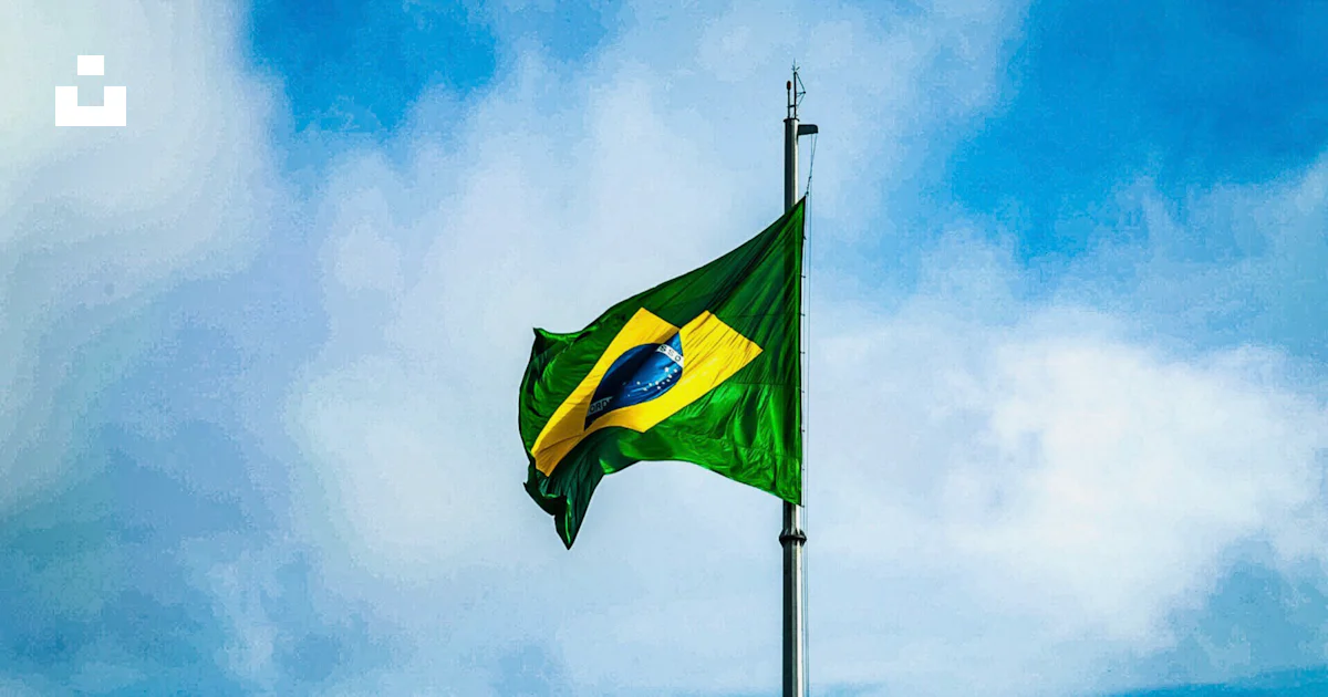 Green and yellow flag under blue sky photo – Free American flag Image ...