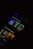 A smartphone screen displaying a music application interface with recently played and newly added tracks, featuring album artwork and text mainly in French.