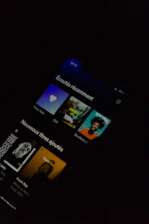 Audio guide interface displayed on a smartphone with navy and white theme