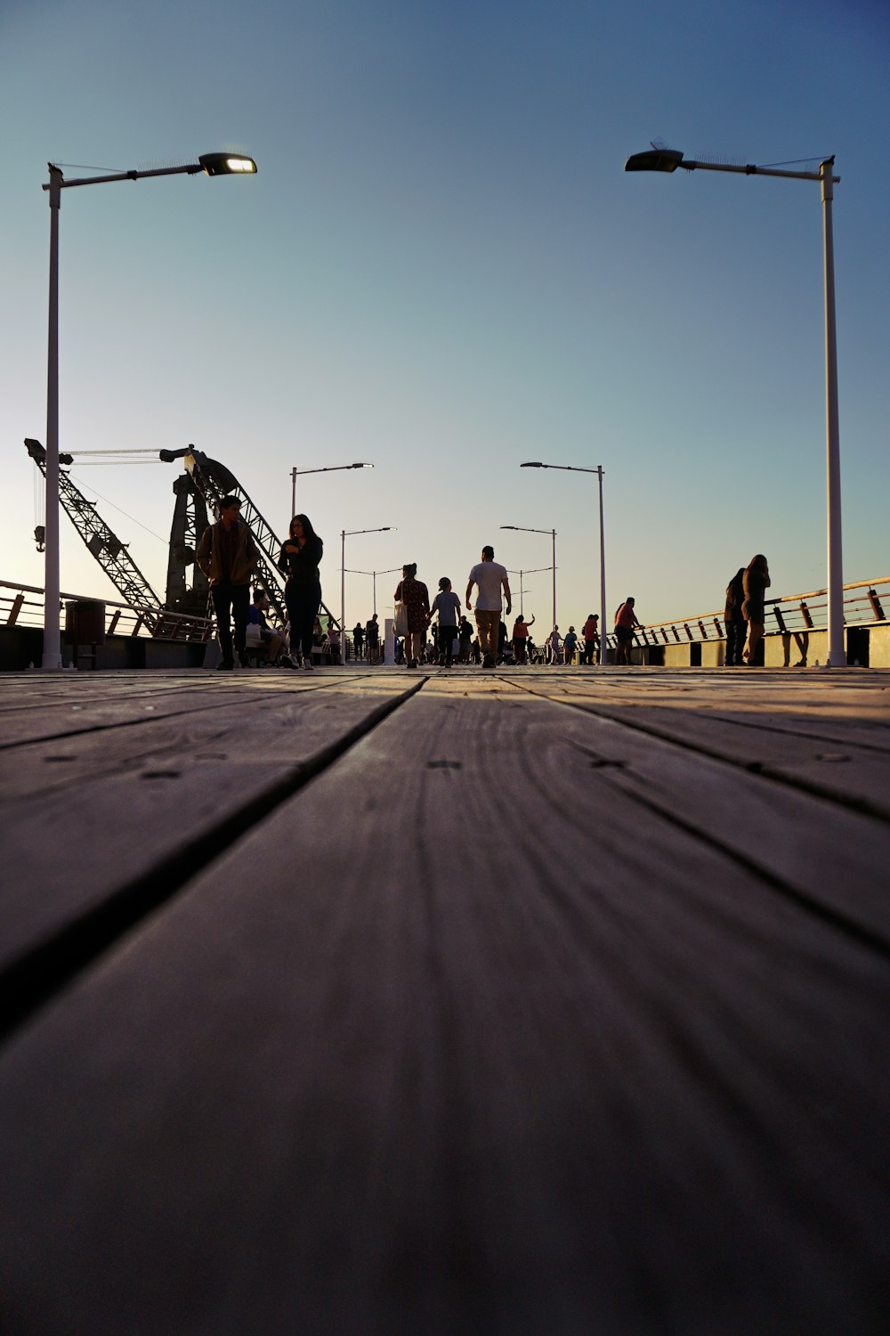 people riding bicycle on road during daytime